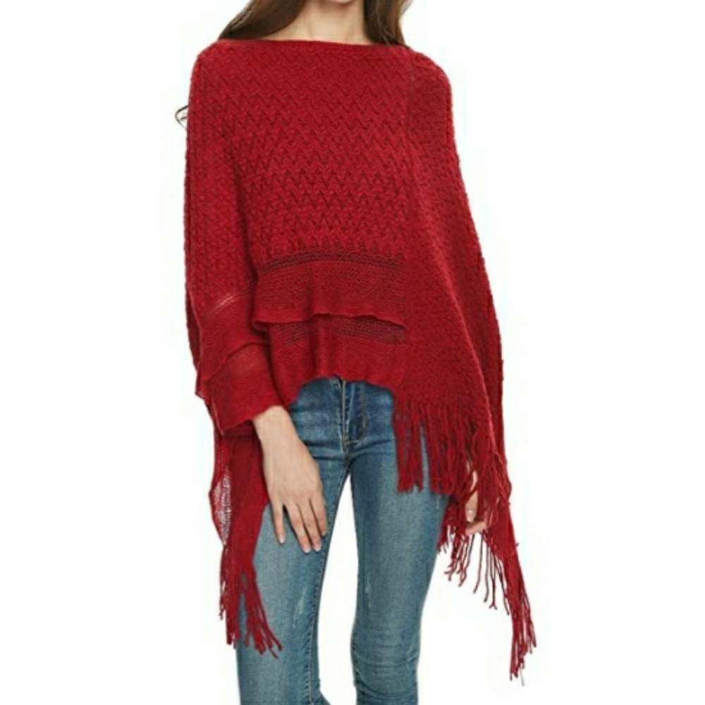 Fringed knitted poncho